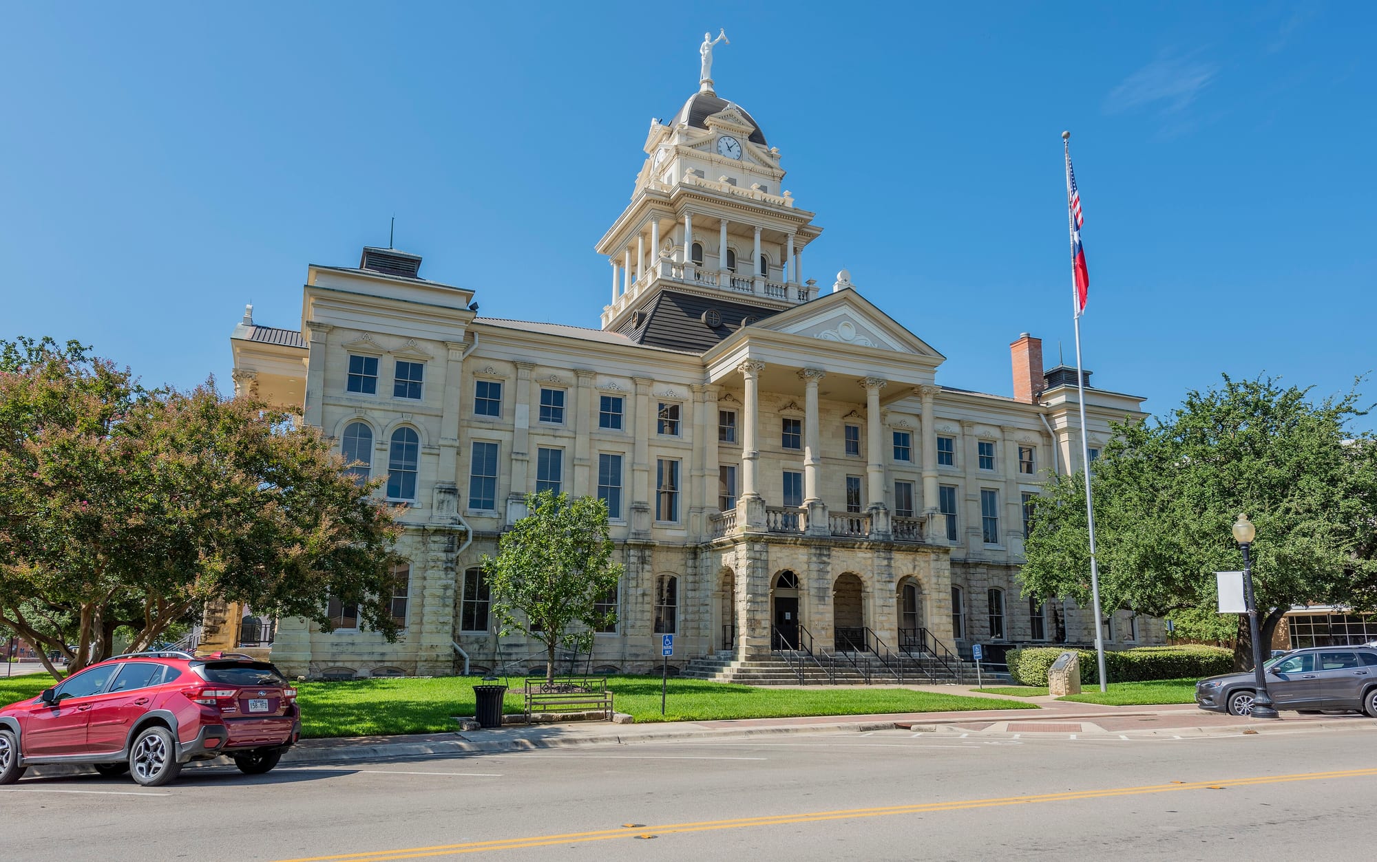 The Bell County Courthouse in Belton, Texas, under a clear sky